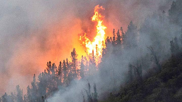 Zinke says California wildfires not linked to climate change