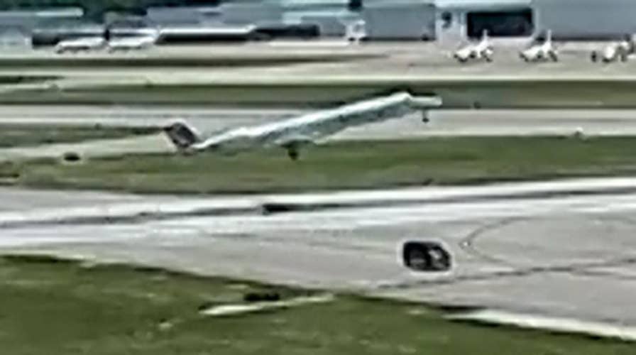 Plane narrowly misses van crossing runway