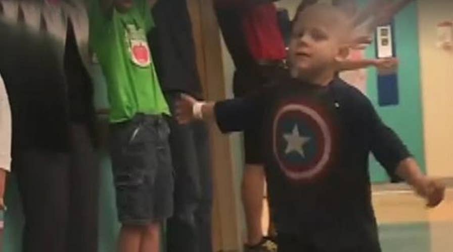 Child cheered on after completing last round of chemo