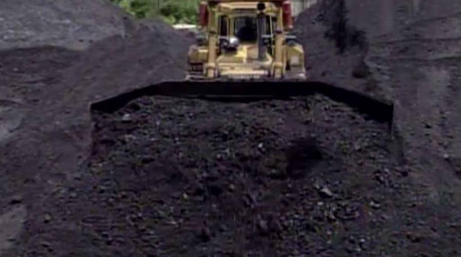 Trump set to roll back restrictions on coal-burning plants