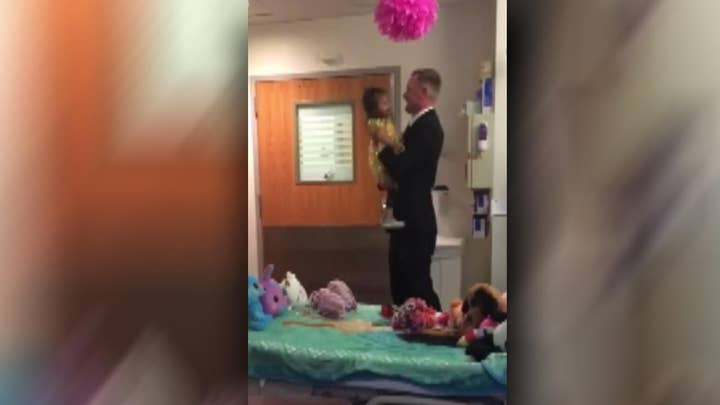 Dad and daughter share dance on her last day of chemo