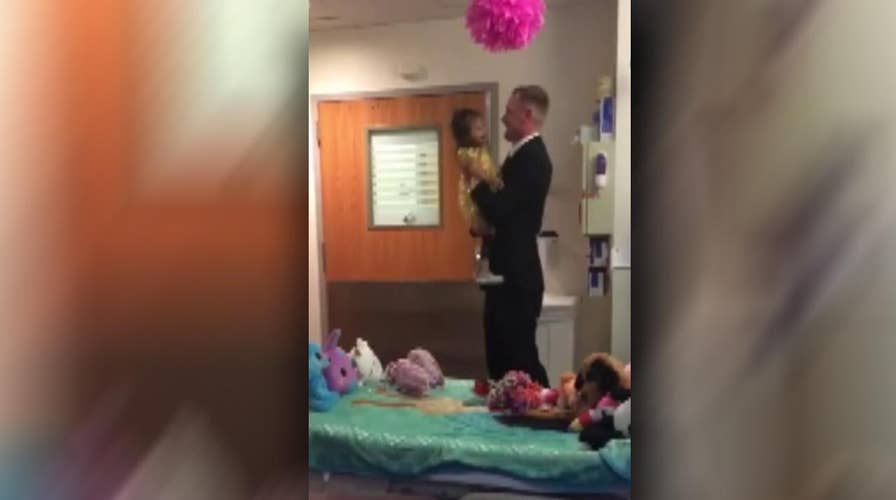 Dad and daughter share dance on her last day of chemo