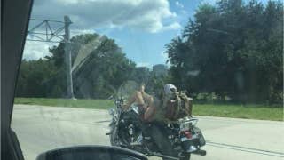 Florida resident captures video of motorcyclist steering with feet - Fox News