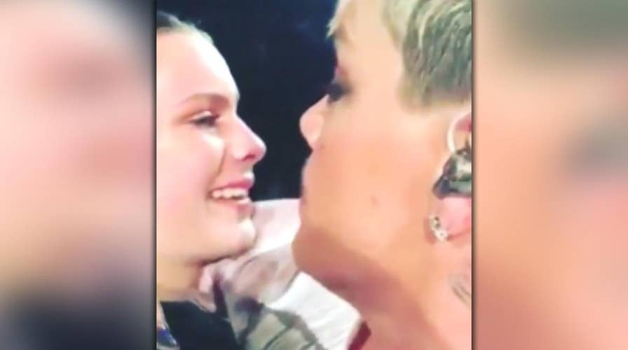 Raw video: Pink interrupts Brisbane show to comfort fan