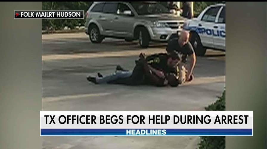 Officer begs bystanders for help in arrest.