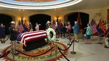 McCain's kin weep over casket at emotional memorial; crowds brave Phoenix heat for hours for chance to bid farewell