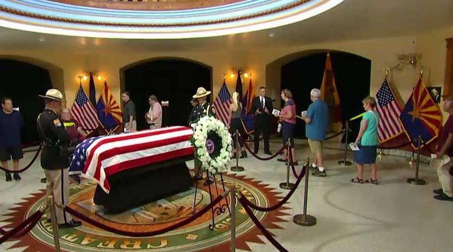 People pay respects to McCain in Arizona