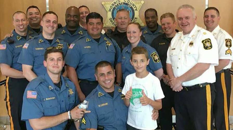 Boy entrepreneur inspires kids to support the police