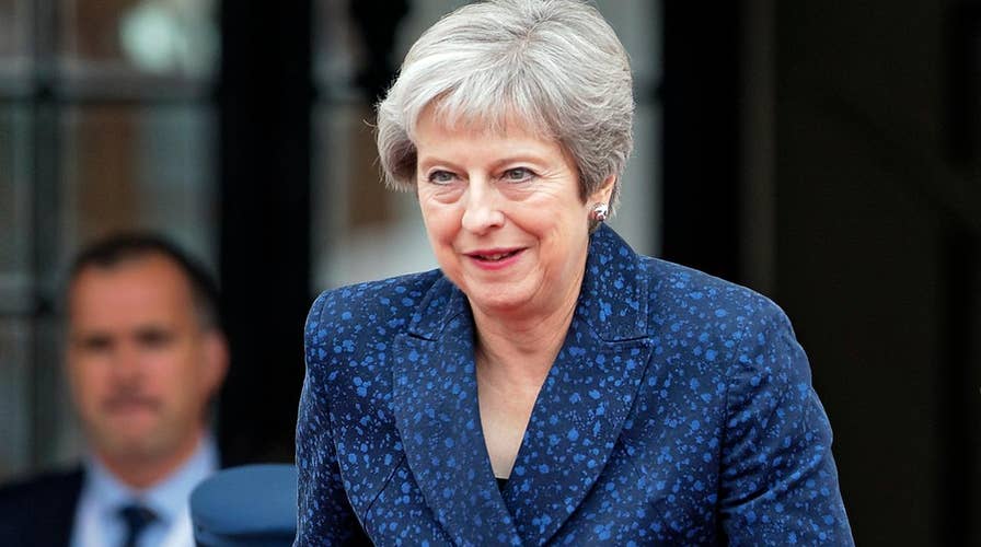 Theresa May shows off her dance moves in Africa