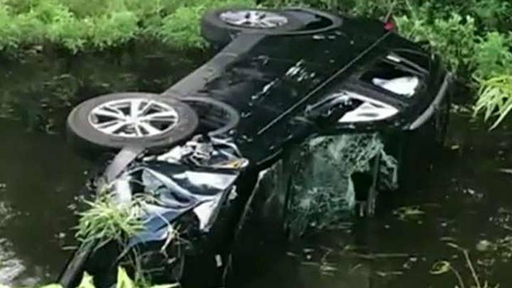 Siblings rescue family from overturned SUV