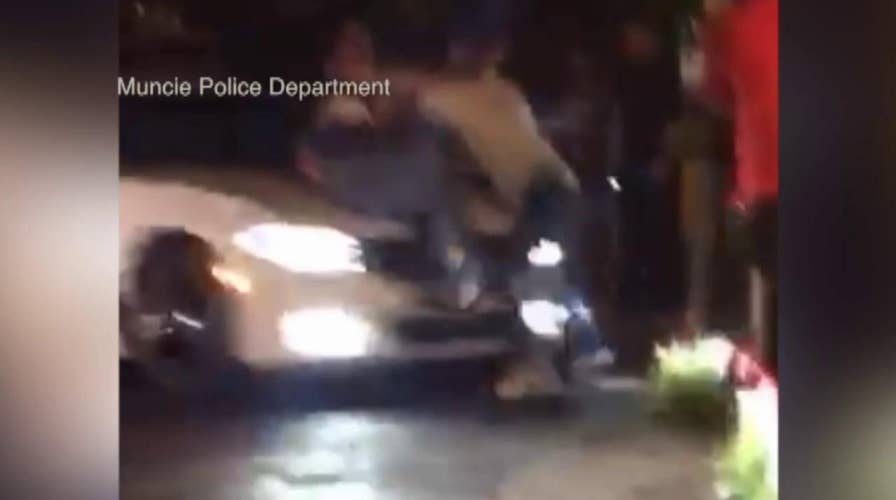 Driver slams into crowd in Muncie parking lot