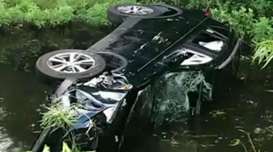Siblings rescue family from overturned SUV