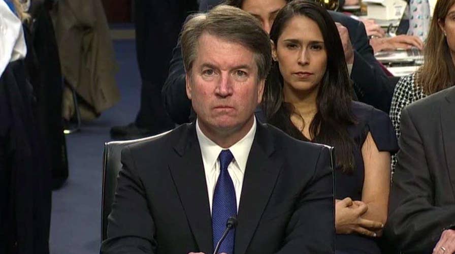 Protests interrupt Kavanaugh confirmation hearing