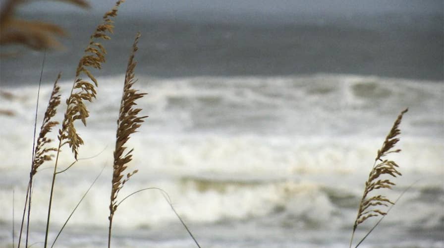 Vacationers stay positive as Gordon slams Gulf Coast