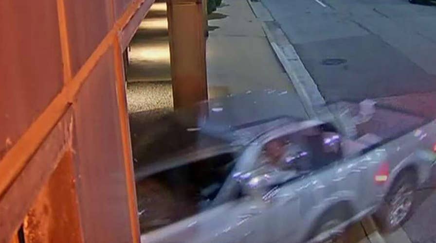 Surveillance video shows man driving into Dallas FOX station