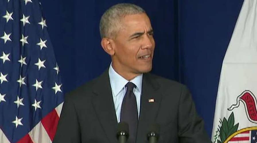 Obama takes credit for economy as Trump lists achievements