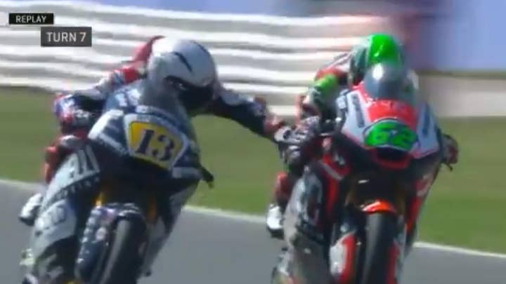 Motorcycle racer banned after grabbing competitor handbrake