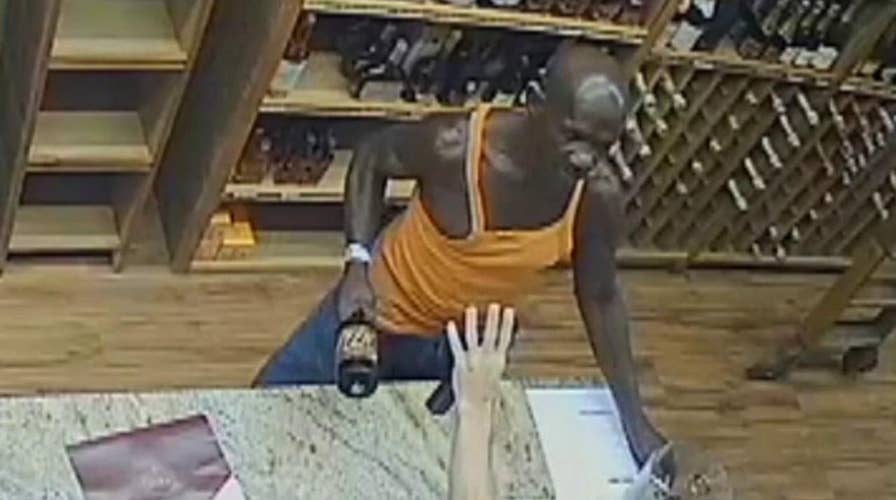 Man attempts to rob liquor store using bottle