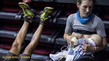 Moment ultra-marathoner breastfeeds baby 16 hours into 107-mile race