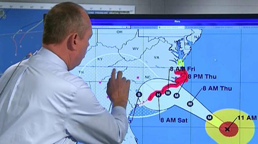Florence expected to slow down, scrape along Carolina coast