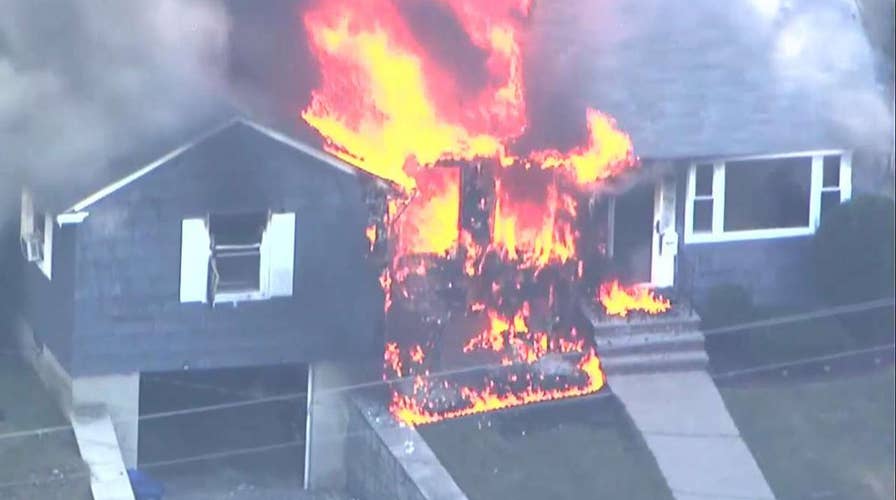 Suspected gas explosions hit Massachusetts communities