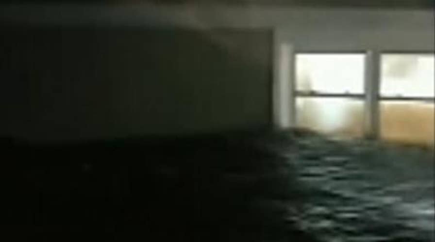 Floodwaters rise above ground floor of house in NC