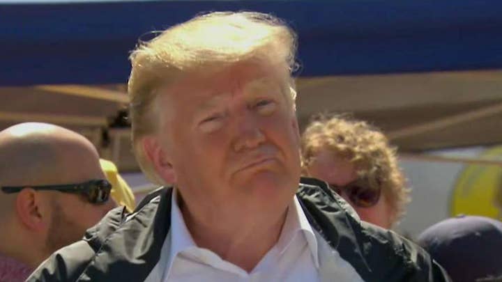 Trump visits aid distribution center in North Carolina