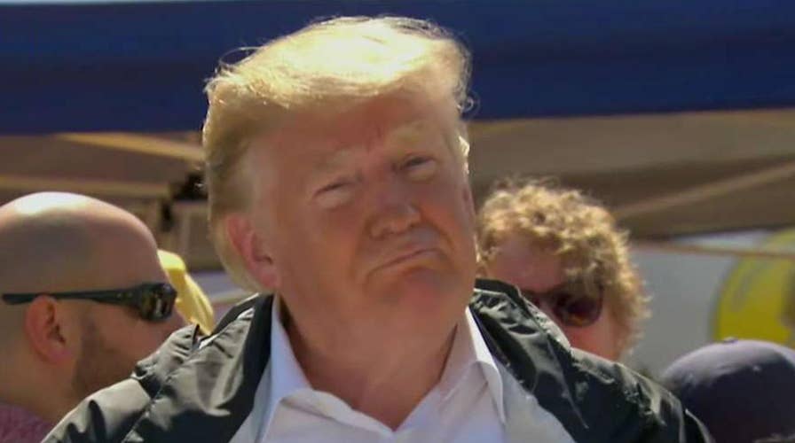 Trump visits aid distribution center in North Carolina