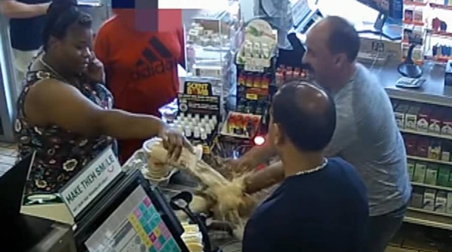 Angry customer pours iced coffee on New York store's counter