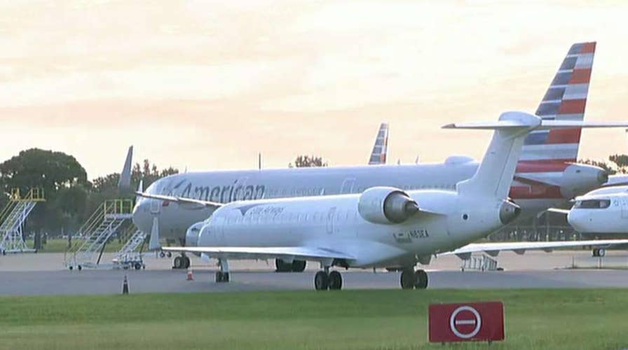 Police: Suspect hops fence, boarded empty plane in Orlando