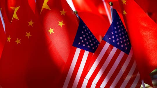 US ambassador accuses China of 'bullying' with 'propaganda ads'