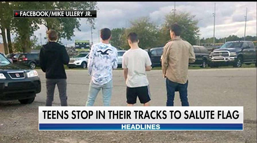 Teens Stop in Their Tracks When They Hear National Anthem