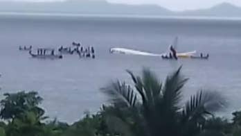Air Niugini revises report, says 1 passenger missing after crash-landing in Micronesia
