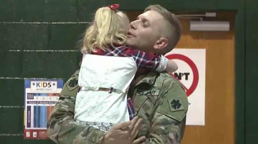 Returning soldier surprises 5-year-old daughter at school