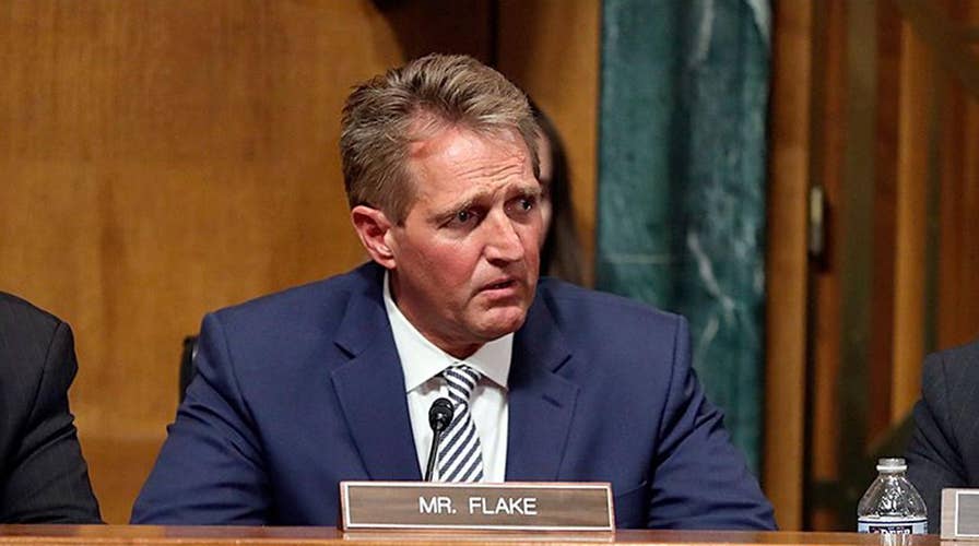 Senator Jeff Flake calls for delay in Kavanaugh confirmation