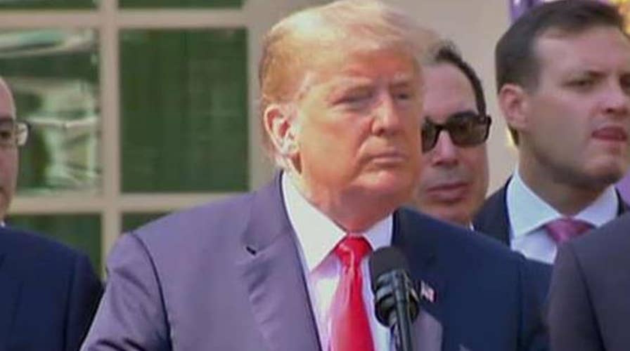 Trump spars with press over trade and Kavanaugh