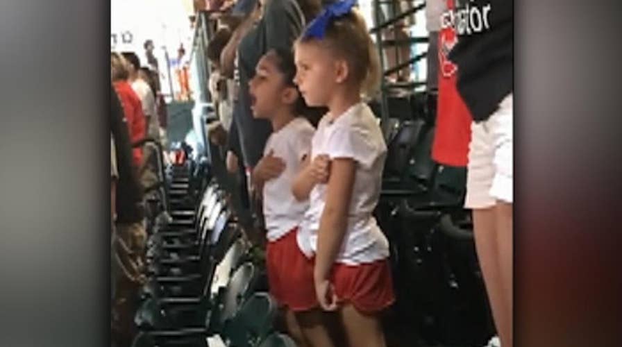Little girl proudly sings national anthem at Astros game 