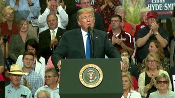 Trump at Mississippi rally defends Kavanaugh, slams Ford's claims