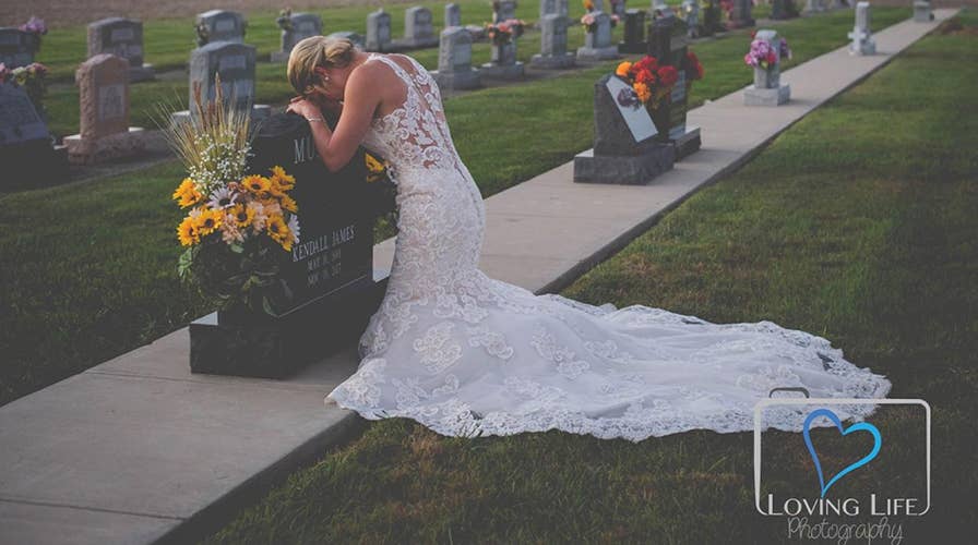 Bride poses for wedding photos alone after fiancé killed by drunk driver