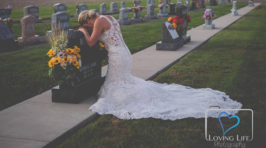 Bride poses for wedding photos alone after fiancé killed by drunk driver