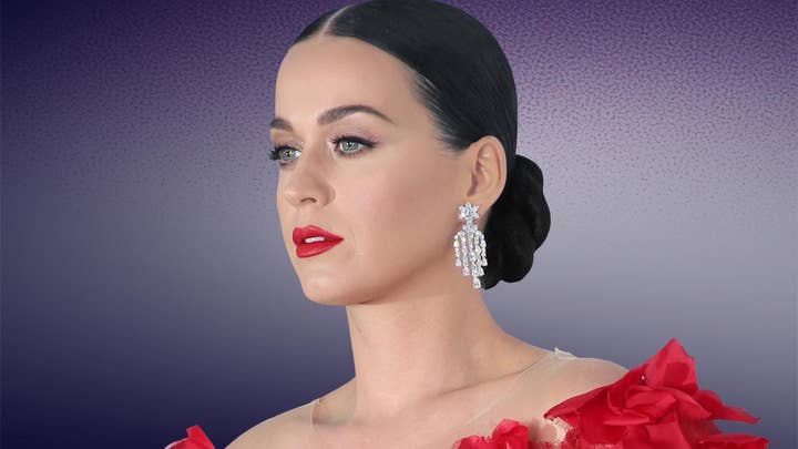 Katy Perry takes a break; Ruby Rose suits up
