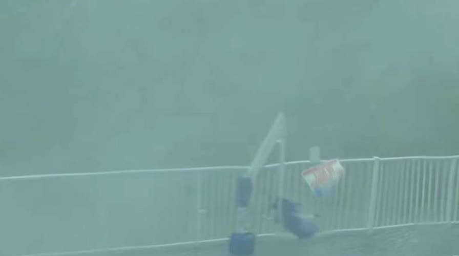 Hurricane force winds send debris flying in Apalachicola