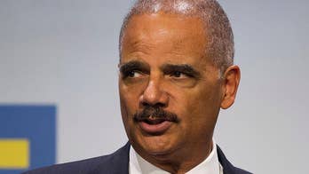 Former AG Holder formally backs Biden's White House bid