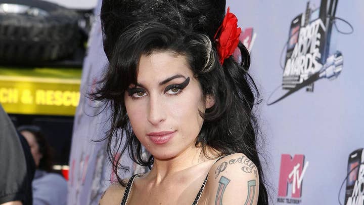 An Amy Winehouse hologram; Banksy's shredded art sells