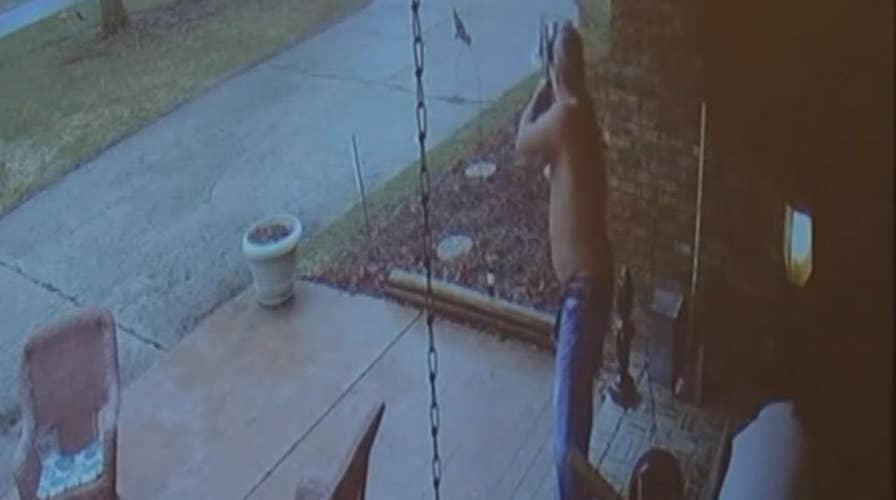 Security footage shows Michigan man shooting at black teen