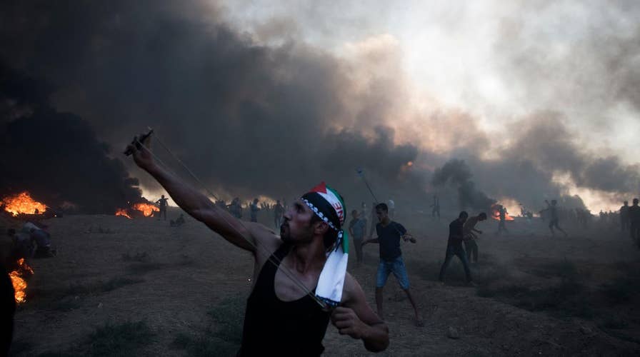 Tens of thousands protesting at Israeli-Gaza border