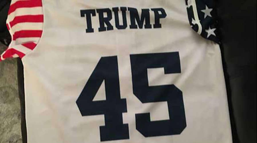 Principal forces student to remove Trump jersey at game