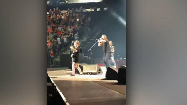 Foo Fighters, 10-year-old boy perform Metallica at concert