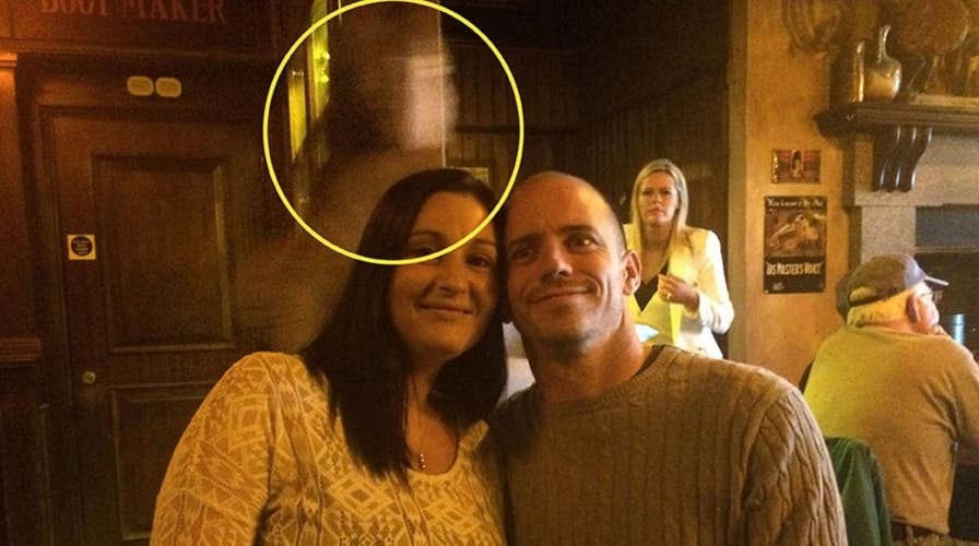 Tourist couple's photo contains eerie Titanic ghost?