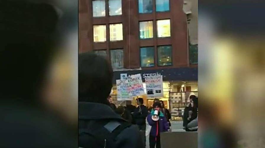 Henry Kissinger heckled during speech